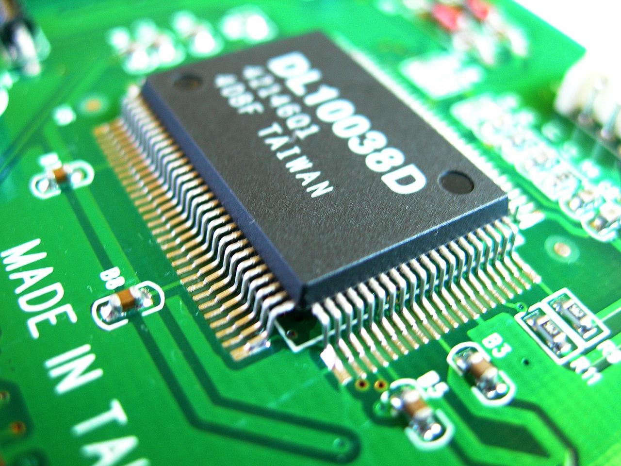 Close-up of a microchip on a circuit board Free Stock Photo | FreeImages Close-up of a microchip on a circuit board Free Stock Photo | FreeImages